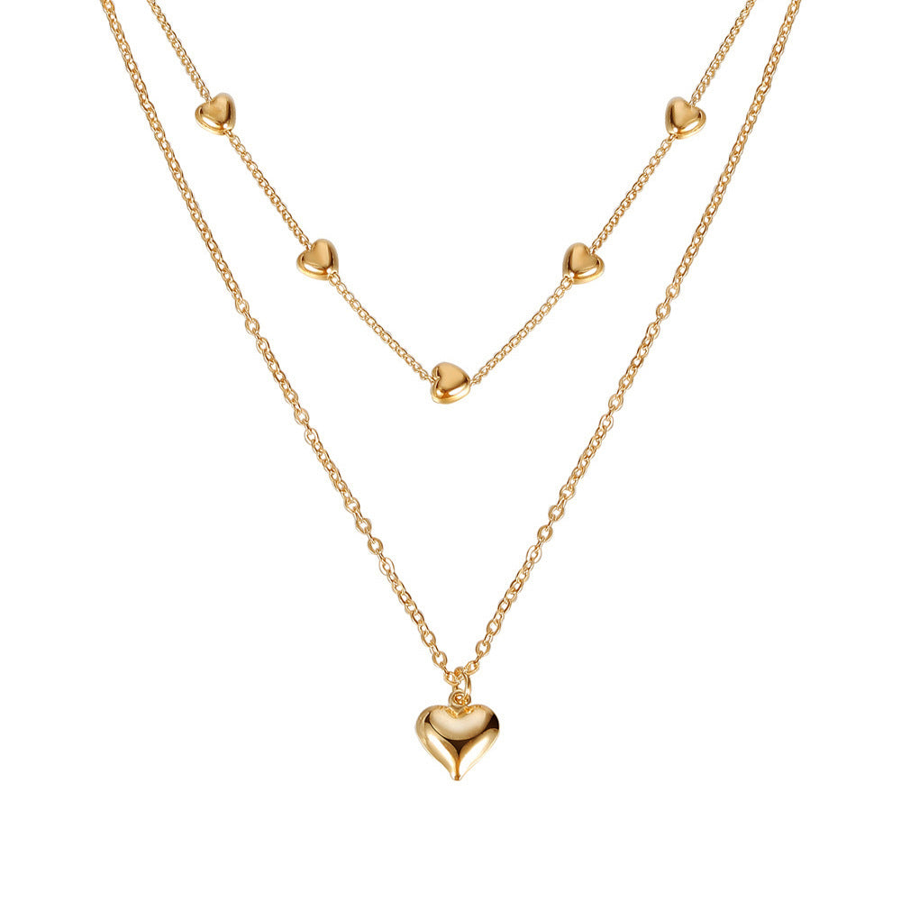 Chaînes dorées à double rang pendentif cœur - StyleNova Paris