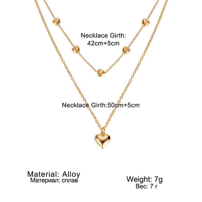 Chaînes dorées à double rang pendentif cœur - StyleNova Paris
