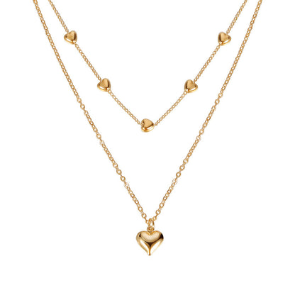 Chaînes dorées à double rang pendentif cœur - StyleNova Paris